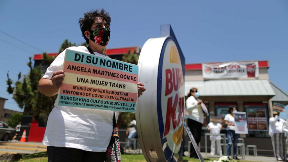 PHOTO: People protest to demand increased safety measures from Burger King after employees said a fellow worker died amid the outbreak of the coronavirus, in Los Angeles, July 10, 2020.