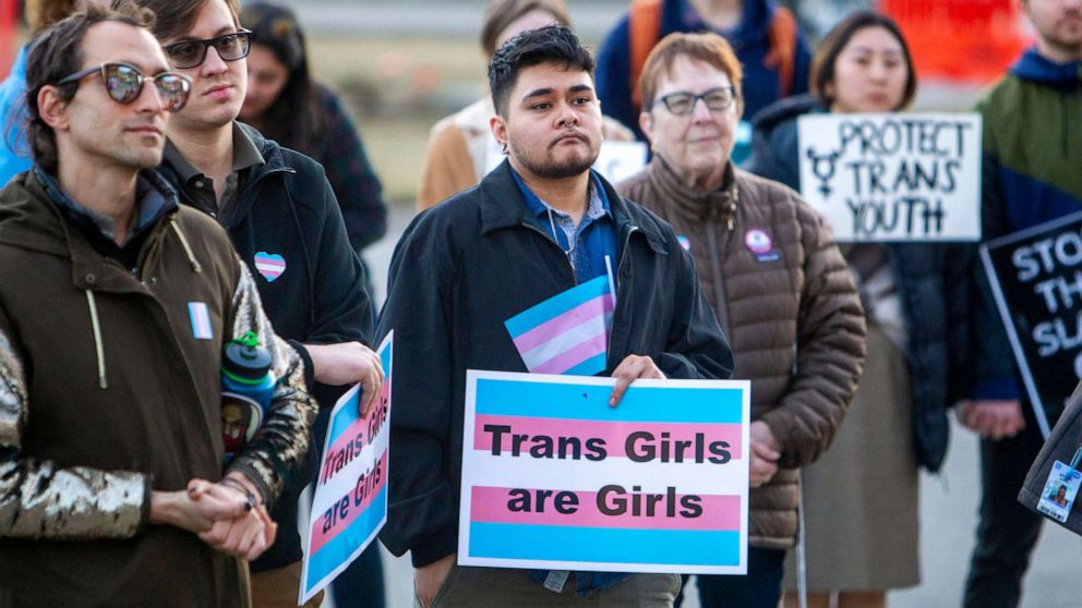 PHOTO: People rally at the Capitol in Boise, Idaho, March 4, 2020, in support of transgender students and athletes.