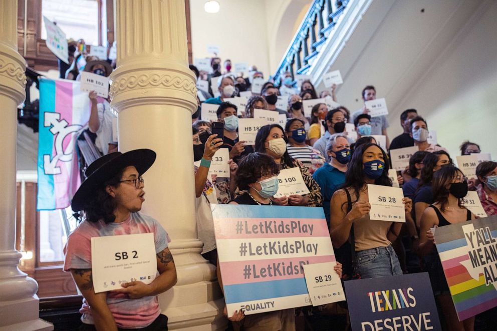 PHOTO: LGBTQ rights supporters gather at the Texas State Capitol to protest state Republican-led efforts to pass legislation that would restrict the participation of transgender student athletes.