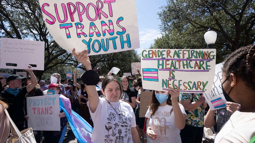 PHOTO: Transgender youth and their loved ones rally at the State Capitol in Austin, Texas, on March 1, 2022, decrying Governor Greg Abbott's directive to state health agencies to investigate gender-affirming care to transgender youth as child abuse.