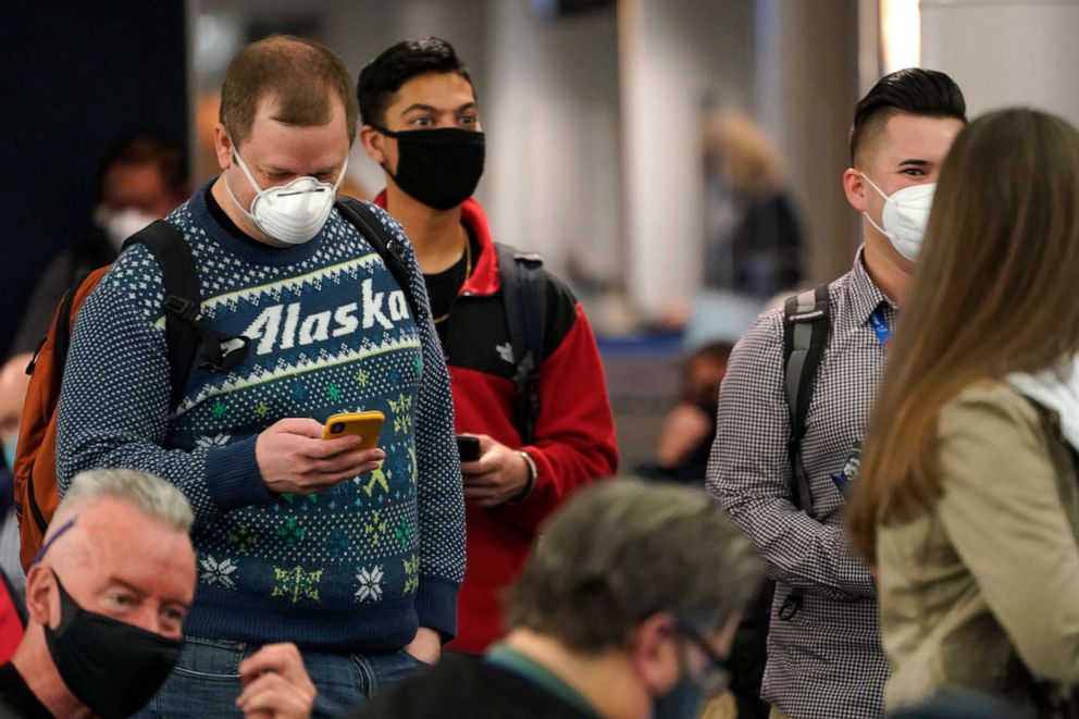 PHOTO: Passengers wait to board the first Alaska Airlines passenger flight on a Boeing 737-9 Max airplane, March 1, 2021, for a flight to San Diego from Seattle-Tacoma International Airport in Seattle.