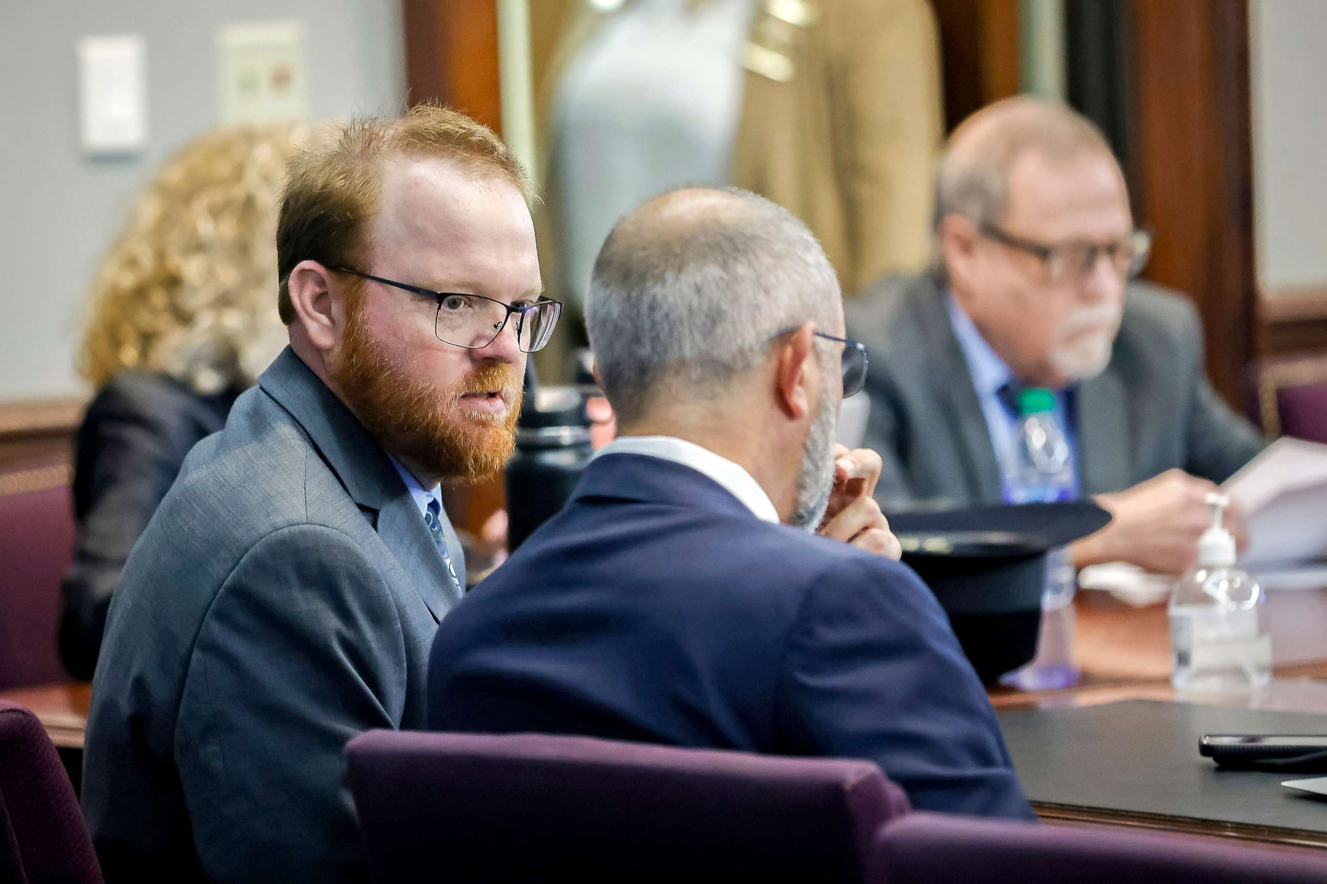 PHOTO: Travis McMichael, left, speaks with his attorney Jason B. Sheffield during sentencing for the killing of Ahmaud Arbery in the Glynn County Courthouse, in Brunswick, Ga., Jan. 7, 2022.