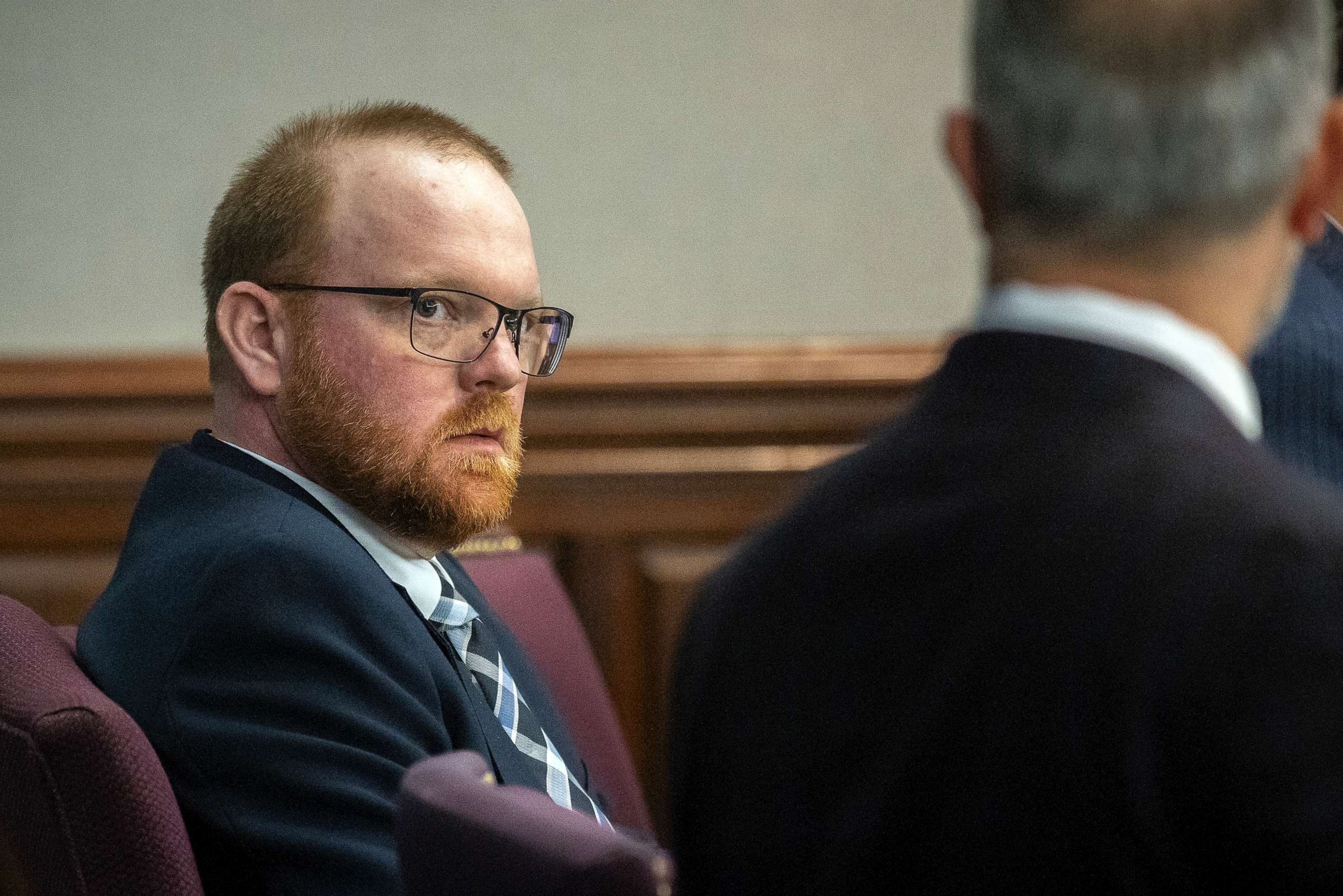PHOTO: Travis McMichael listens to one of his attorneys during a motion hearing in the Glynn County Courthouse, Thursday, Nov. 4, 2021, in Brunswick, Ga.