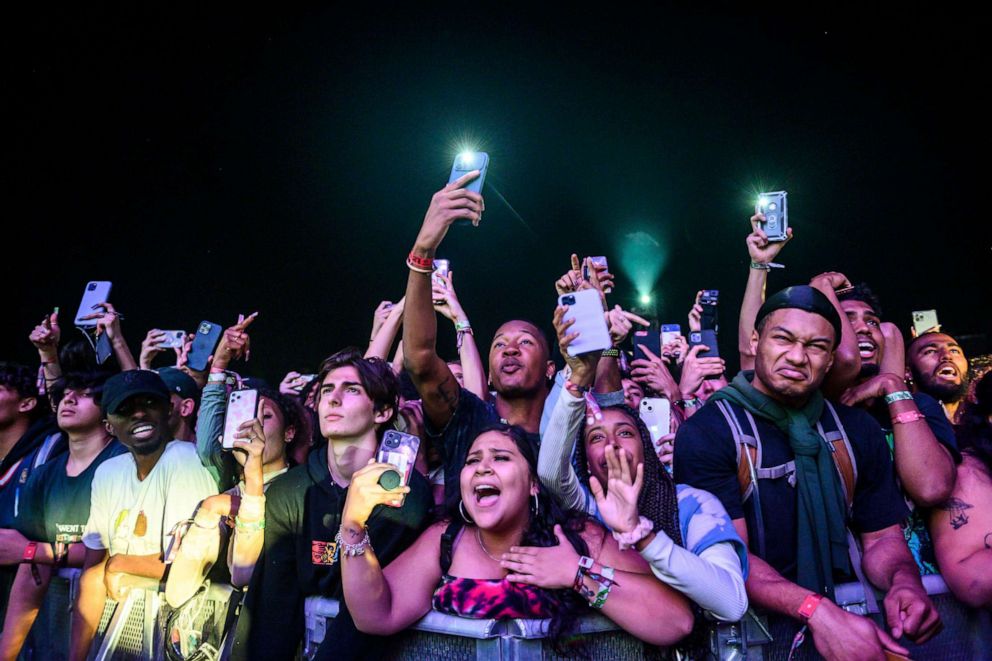 PHOTO: The crowd watches as Travis Scott performs at Astroworld Festival at NRG park on Nov. 5, 2021, in Houston.