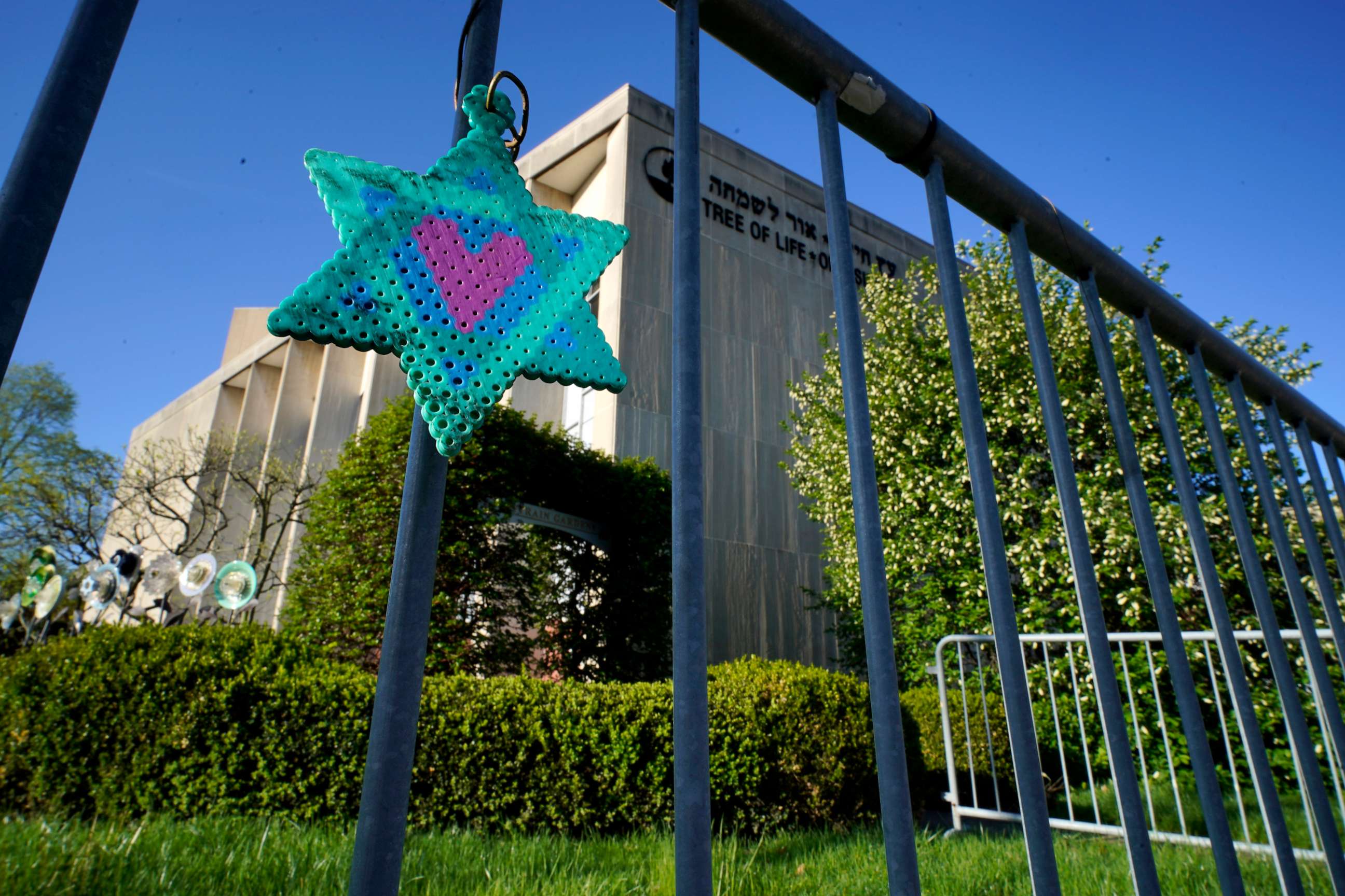 PHOTO: A Star of David hangs from a fence outside the dormant landmark Tree of Life synagogue in Pittsburgh's Squirrel Hill neighborhood, Apr. 19, 2023.