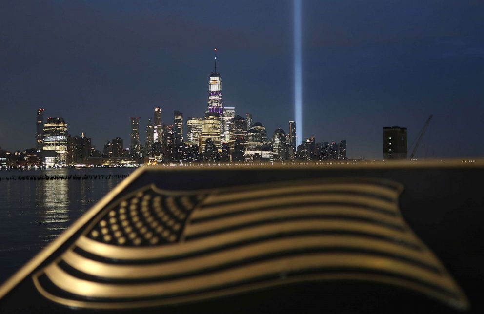 PHOTO: The annual Tribute in Light begins to fade on the skyline of lower Manhattan as the sun rises in New York City on Sept. 12, 2019 as seen from Hoboken, N.J.
