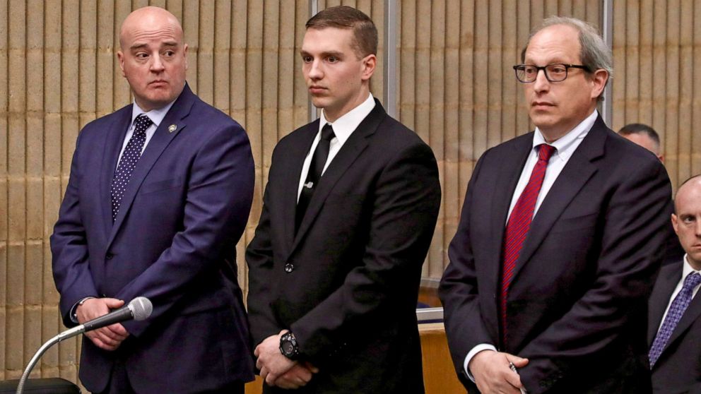 PHOTO: Connecticut State Trooper Brian North, center, Andrew Matthews, Conn. Police Union president and attorney Jeffrey Ment, appears in court, May 3, 2022, in Milford, Conn., on manslaughter charges in the death of Mubarak Soulemane.