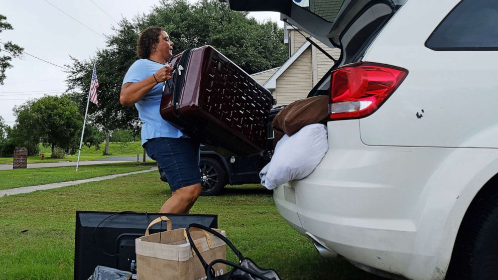 PHOTO: Patra Parker packs up her car to leave her home in Plaquemines Parish, La., in advance of Tropical Storm Barry, on July 11, 2019.