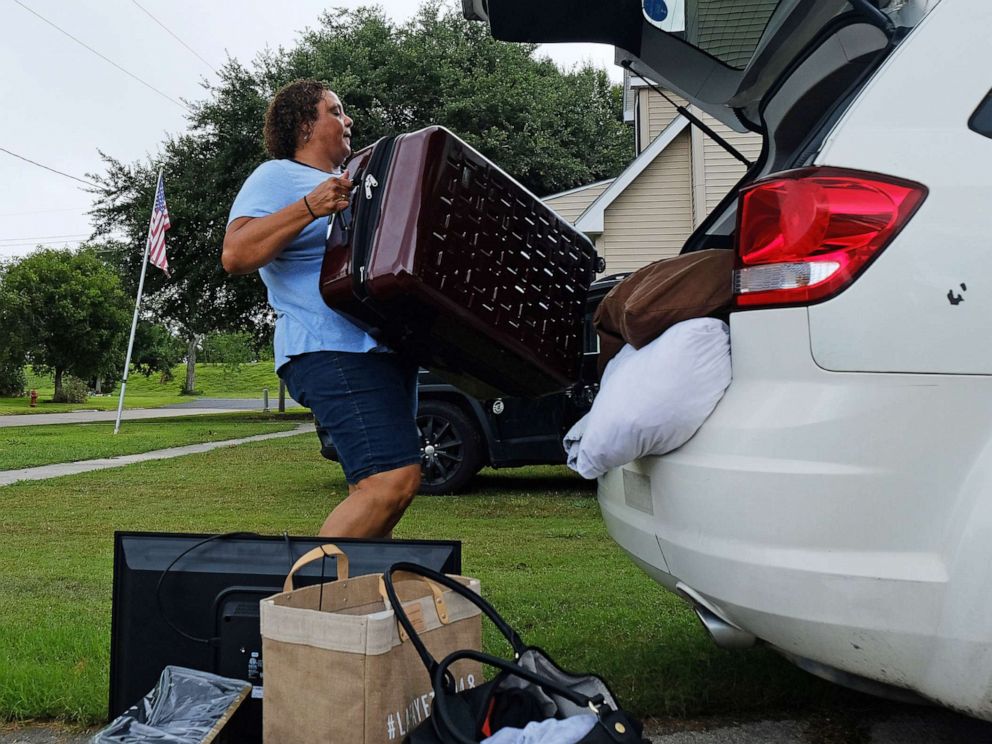 PHOTO: Patra Parker packs up her car to leave her home in Plaquemines Parish, La., in advance of Tropical Storm Barry, on July 11, 2019.