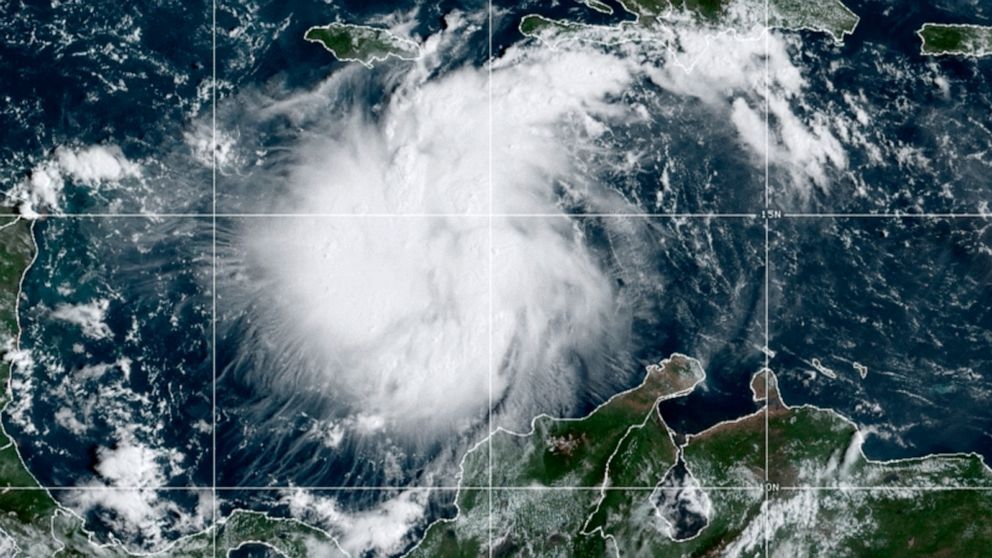 PHOTO: This satellite image provided by the National Oceanic and Atmospheric Administration shows Tropical Storm Ian over the central Caribbean, on Sept. 24, 2022.