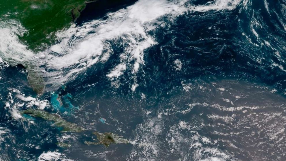 PHOTO: In this geocolor image GOES-16 satellite image taken July 8, 2018, at 15:00 UTC, shows Tropical Storm Beryl, center right, moving across the Lesser Antilles in the eastern Caribbean Sea, and Tropical Storm Chris, top left, off the U.S. East Coast.