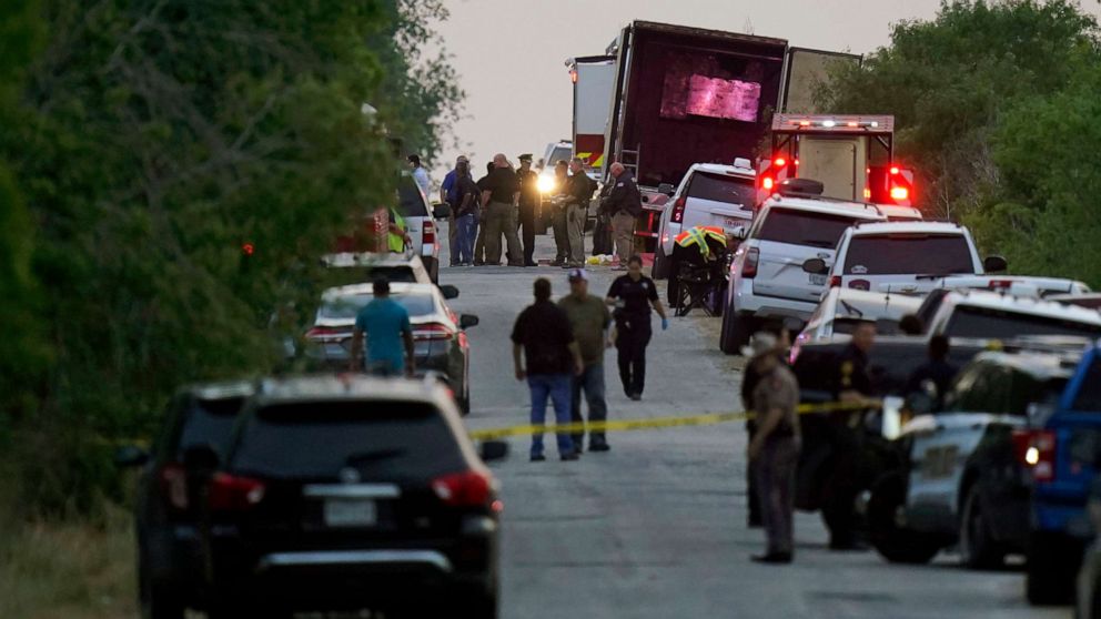 PHOTO: First responders work the scene where dozens of people have been found dead and multiple others were taken to hospitals with heat-related illnesses after a semitrailer containing suspected migrants was found, June 27, 2022, in San Antonio.