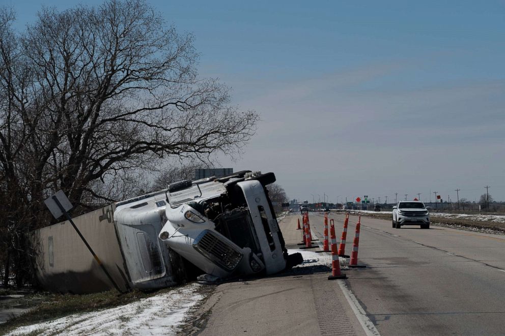 PHOTO: A large trailer truck is seen flipped sideways on Highway 59 on Feb. 16, 2021, in Pierce, Texas. 