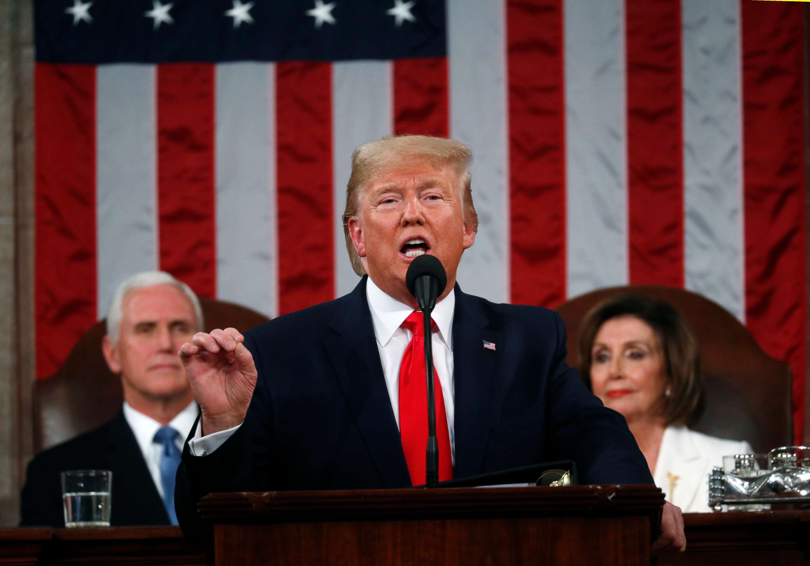 PHOTO: President Donald Trump delivers his State of the Union address to a joint session of Congress in the House Chamber on Capitol Hill in Washington, Tuesday, Feb. 4, 2020, as Vice President Mike Pence and Speaker Nancy Pelosi look on.