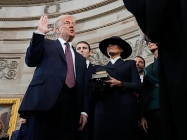 Trump doesn't place hand on Bible during swearing-in