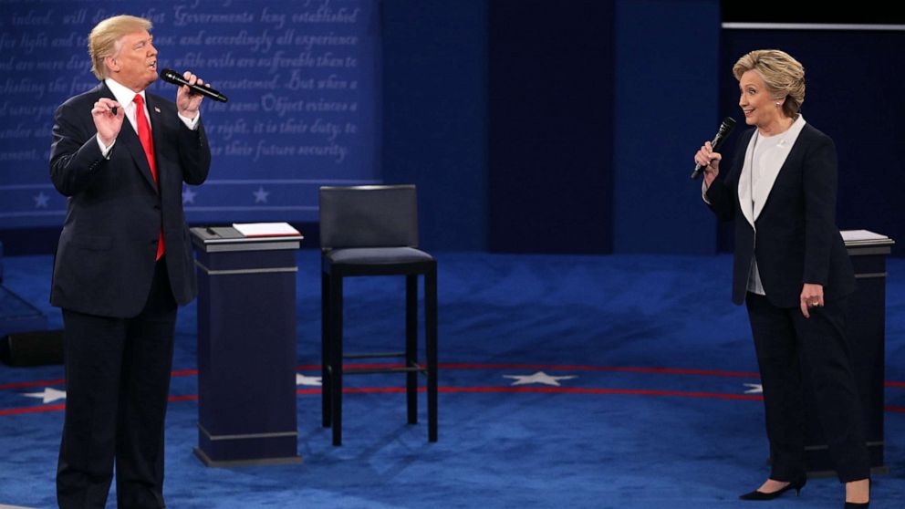 PHOTO: Donald Trump and and Hillary Clinton during the second debate between the Republican and Democratic presidential candidates Oct. 9, 2016, at Washington University in St. Louis.