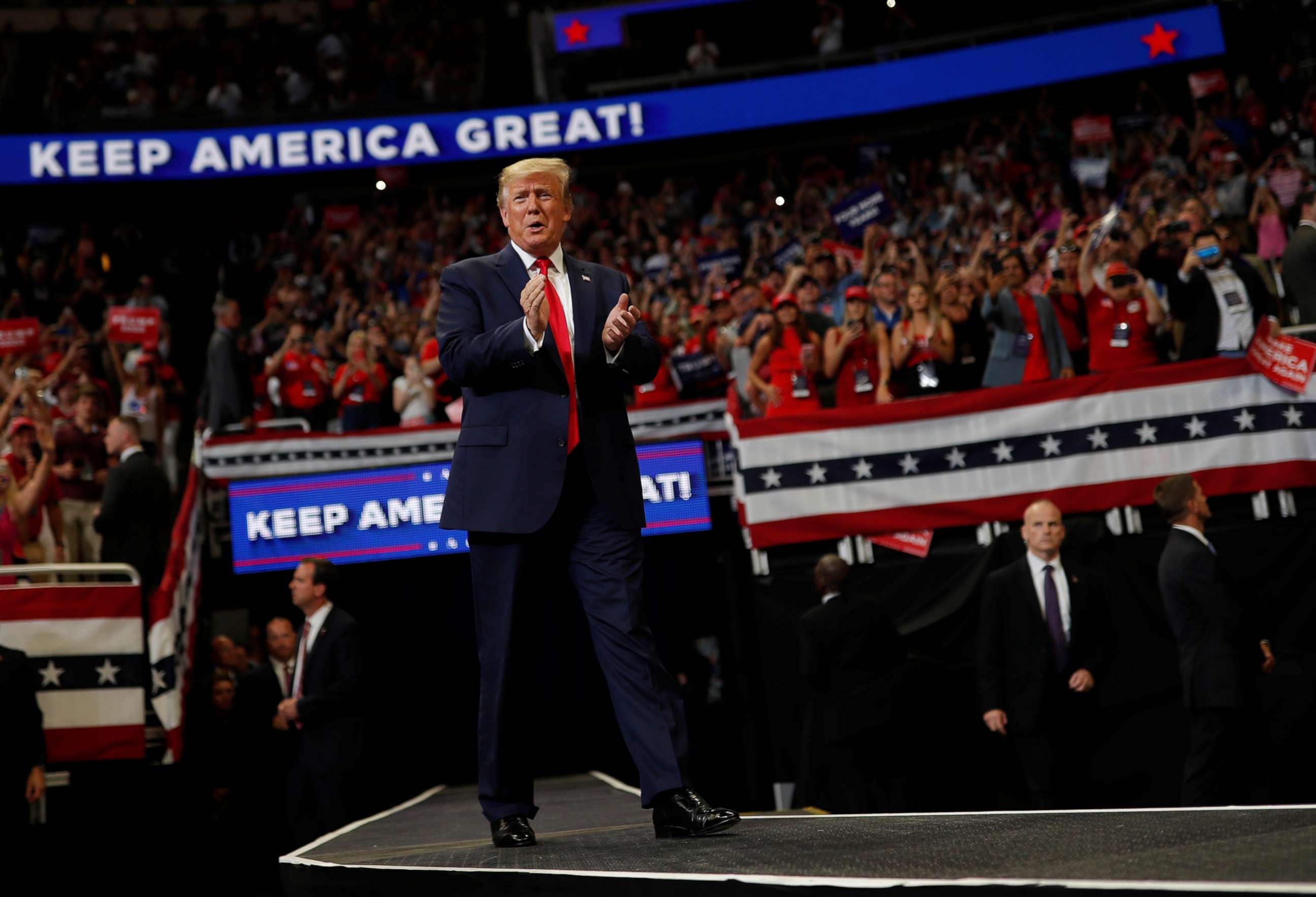 PHOTO: President Donald Trump reacts on stage formally kicking off his re-election bid with a campaign rally in Orlando, Fla., June 18, 2019.  