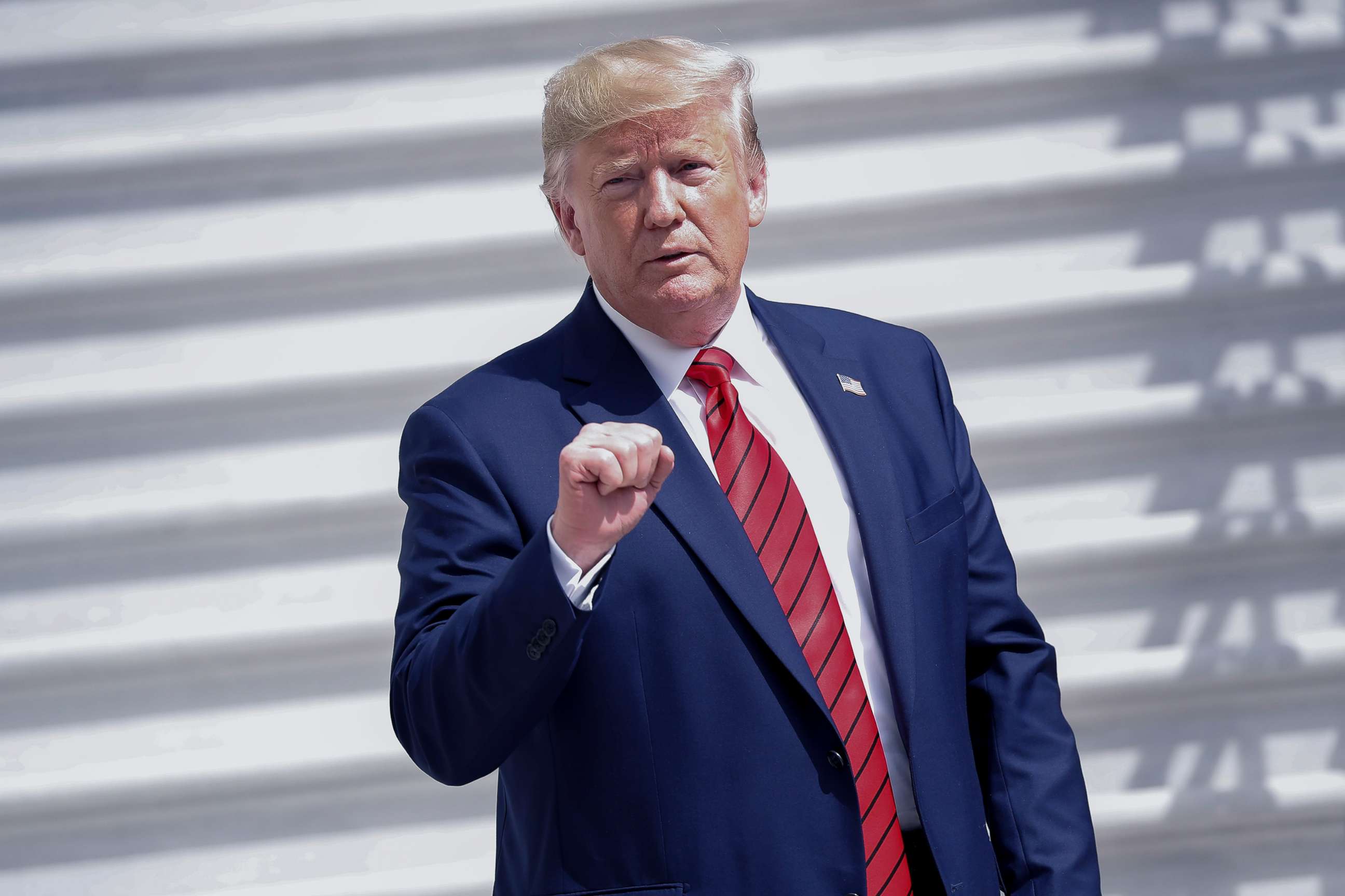 PHOTO: President Donald Trump gestures towards members on the media on the South Lawn of the White House, Sept. 26, 2019, after returning from the United Nations General Assembly.