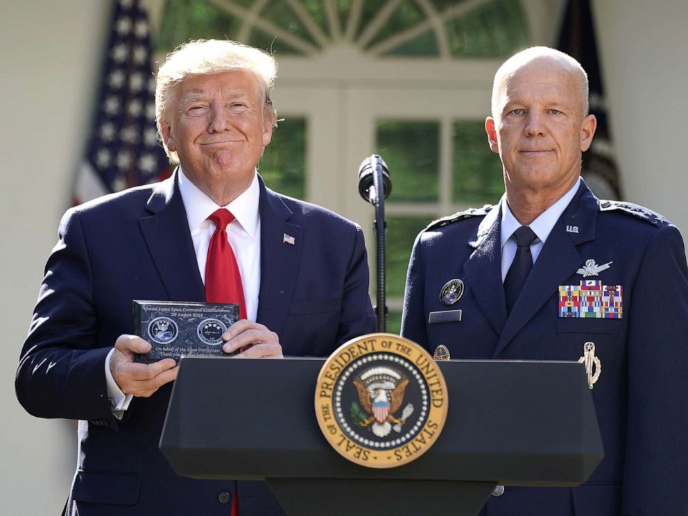 PHOTO: President Donald Trump stands with General John Raymond, incoming U.S. Space Command commander, during an event to officially launch the United States Space Command in the Rose Garden of the White House, Aug. 29, 2019