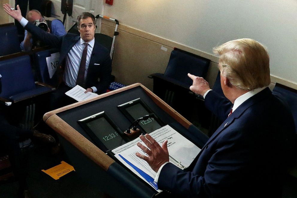 PHOTO: President Donald Trump debates with NBC News White House Correspondent Peter Alexander during a news briefing on the latest development of the coronavirus outbreak in the U.S. at the White House, March 20, 2020, in Washington. 