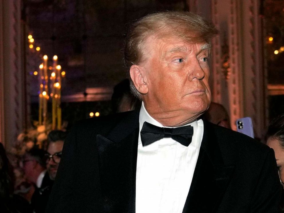 PHOTO: Former President Donald Trump arrives for a New Years Eve party at Mar-a-Lago, in Palm Beach, Fla., Dec. 31, 2022.