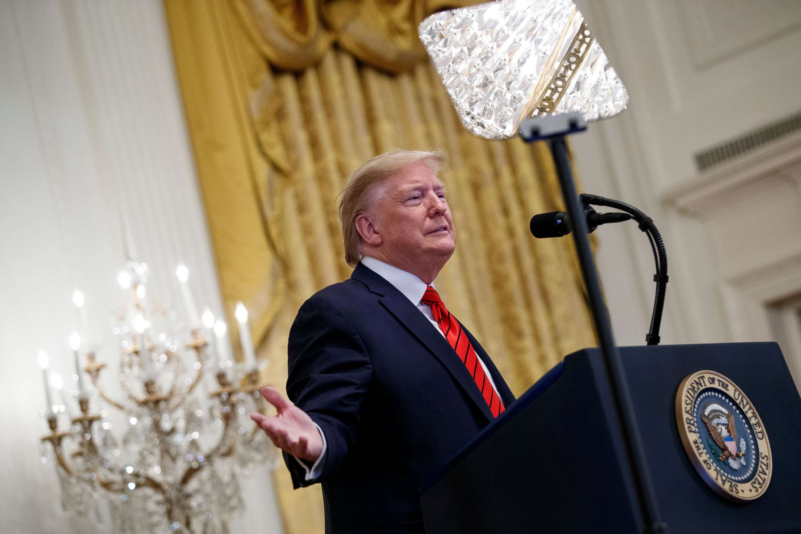 PHOTO: President Donald Trump delivers a speech during the National African American History Month reception in the East Room of the White House, in Washington, Feb. 2020.
