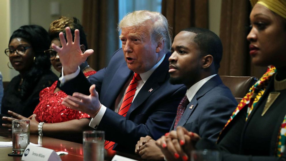 PHOTO: President Donald Trump talks with with African American supporters in the Cabinet Room at the White House on Feb. 27, 2020, in Washington.