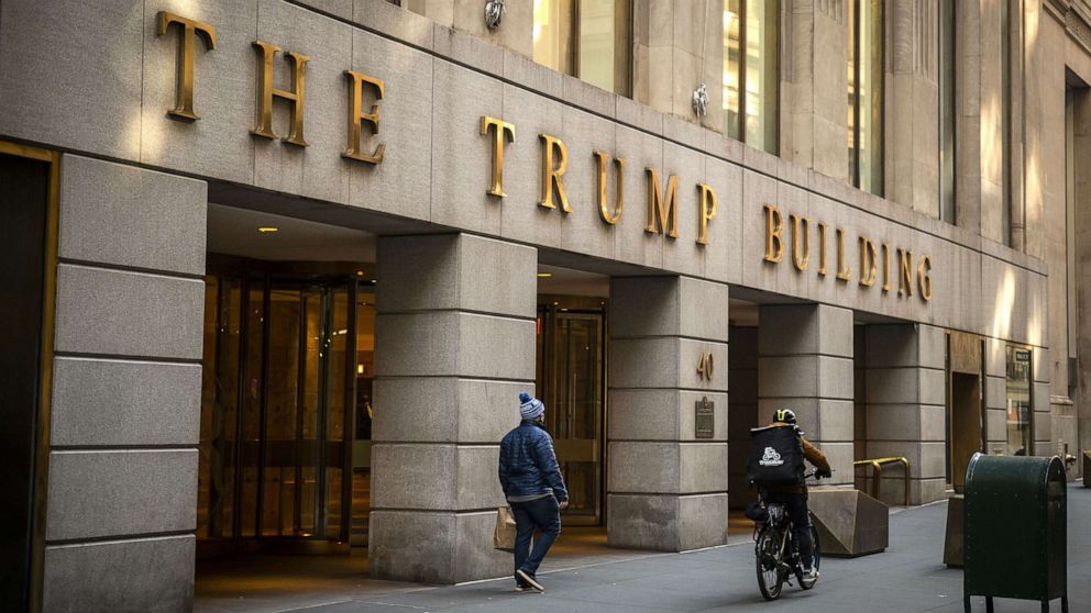PHOTO: In this Jan. 24, 2021, file photo, a pedestrian walks past the Trump Building in New York.