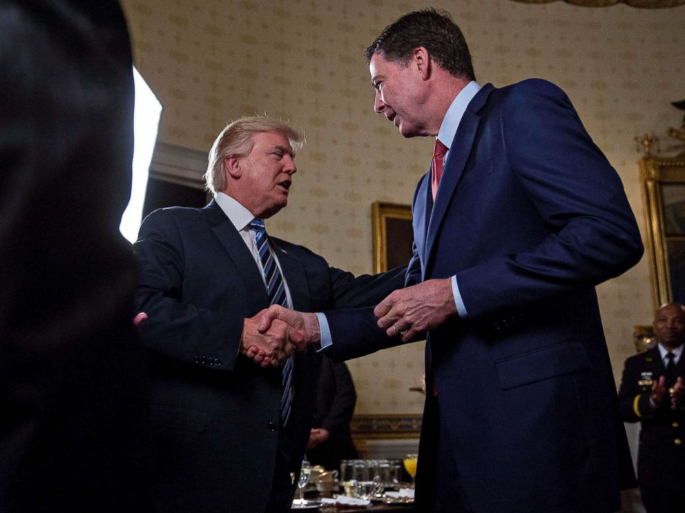 PHOTO: Donald Trump shakes hands with James Comey, during an Inaugural Law Enforcement Officers and First Responders Reception, Jan. 22, 2017, in Washington.