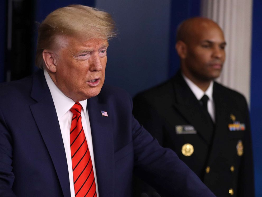 PHOTO: President Donald Trump speaks speaks on the latest developments of the coronavirus outbreak, while flanked by U.S. Surgeon General Jerome Adams, in the James Brady Press Briefing Room at the White House, March 19, 2020 in Washington.