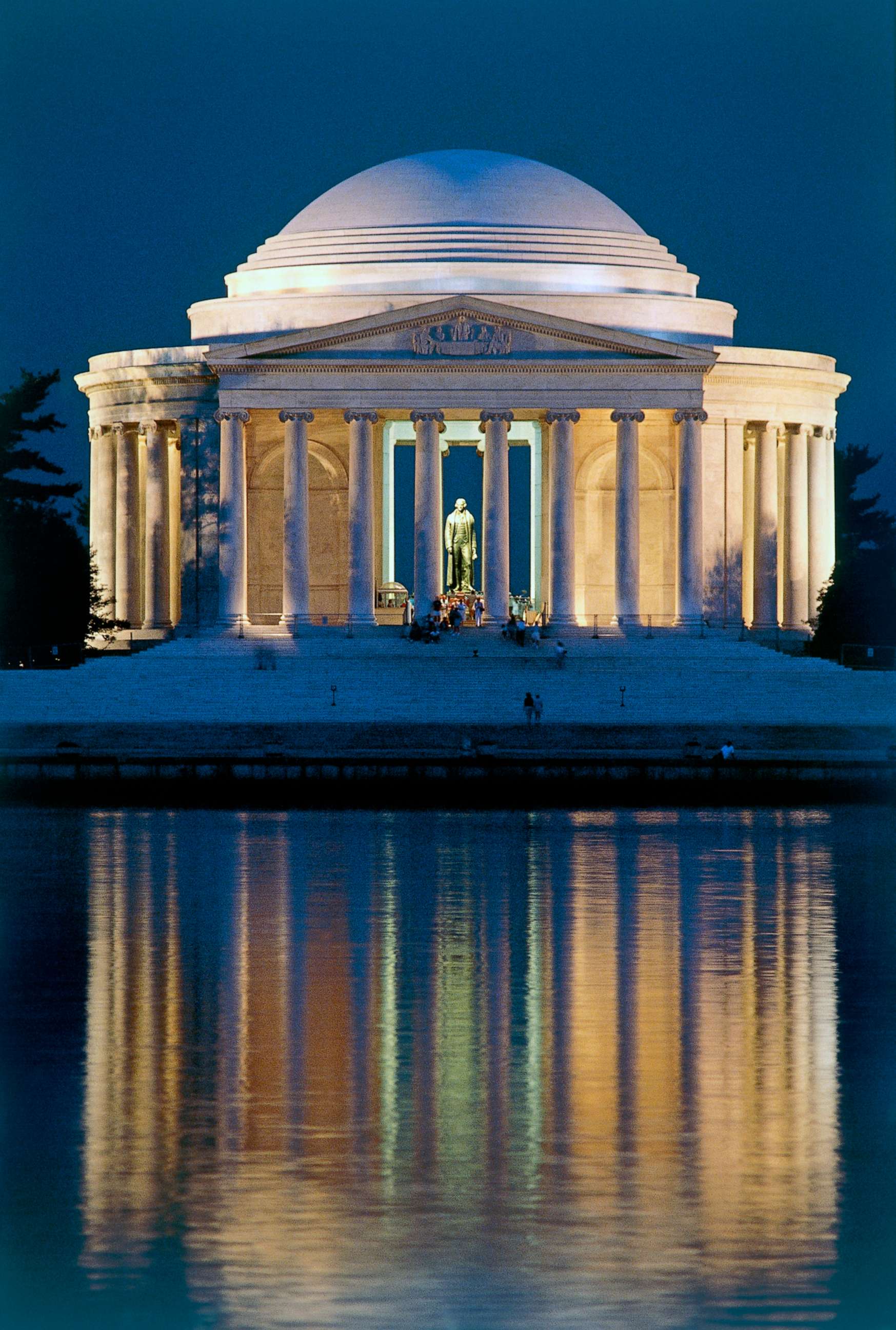 PHOTO: A statue of President Jefferson is visible through the pillars of the Thomas Jefferson Memorial at night in Washington, April 23, 2016.