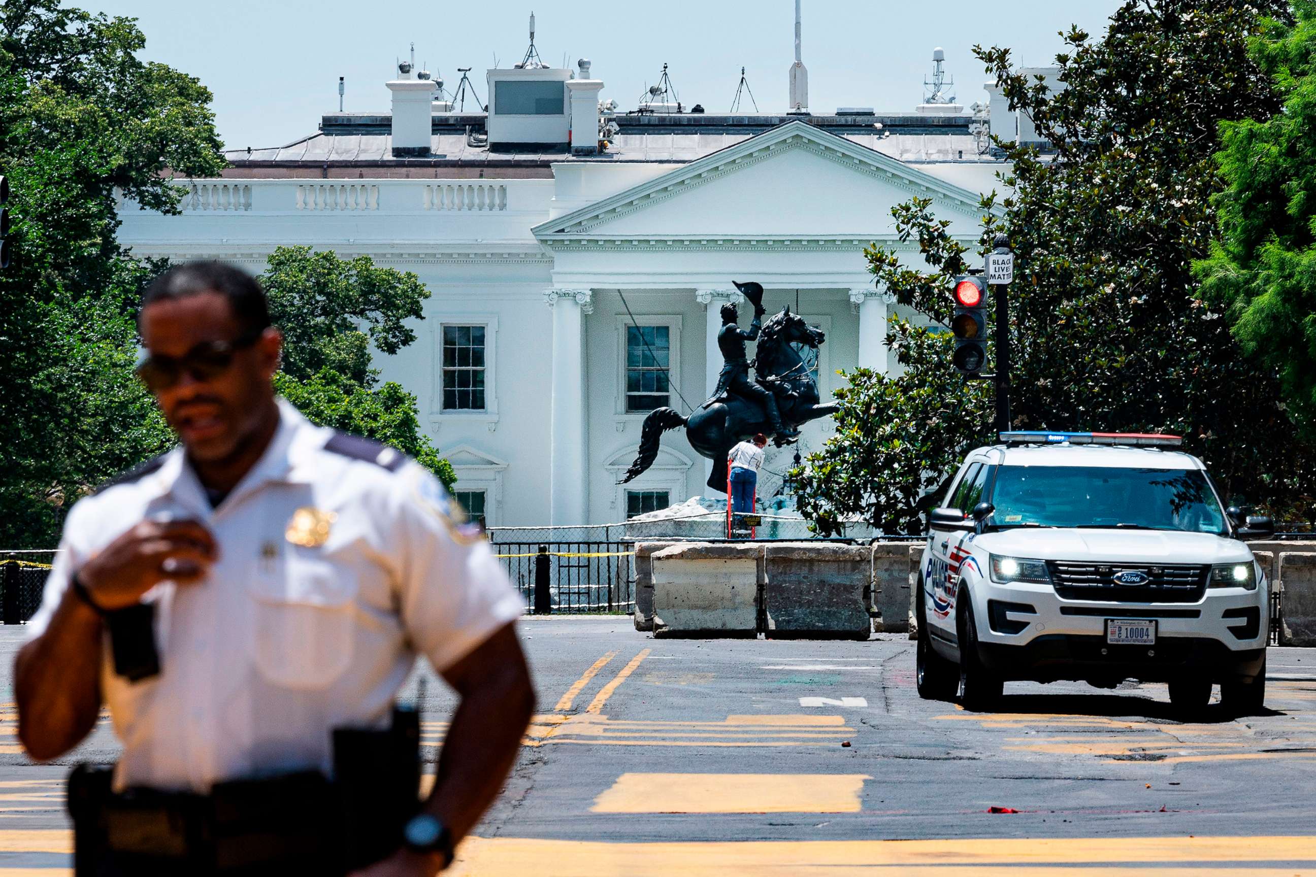 PHOTO: The statue of former President Andrew Jackson is inspected after demonstrators tried overnight to tear it down in Lafayette Park in Washington, June 23, 2020.