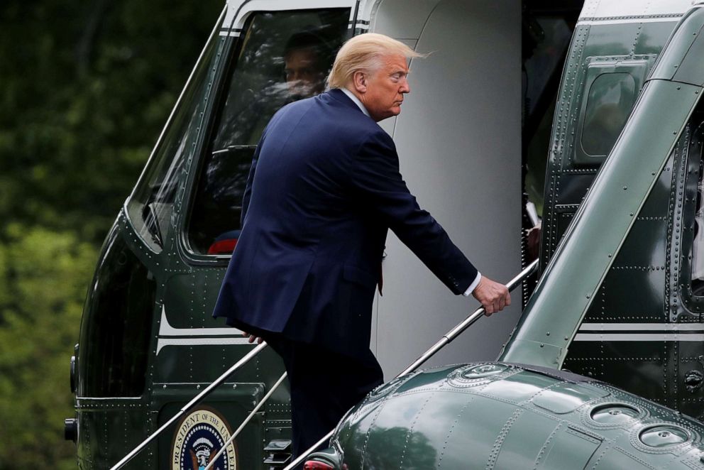 PHOTO: President Donald Trump boards the Marine One helicopter as he departs for travel to the Kennedy Space Center in Florida from the South Lawn at the White House, May 27, 2020.