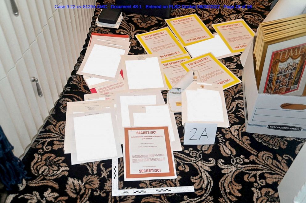 PHOTO: FBI photograph of redacted documents and classified cover sheets recovered from a container stored in former U.S. president Donald Trump's Florida estate that was included in a U.S. Department of Justice filing Aug. 30, 2022. 