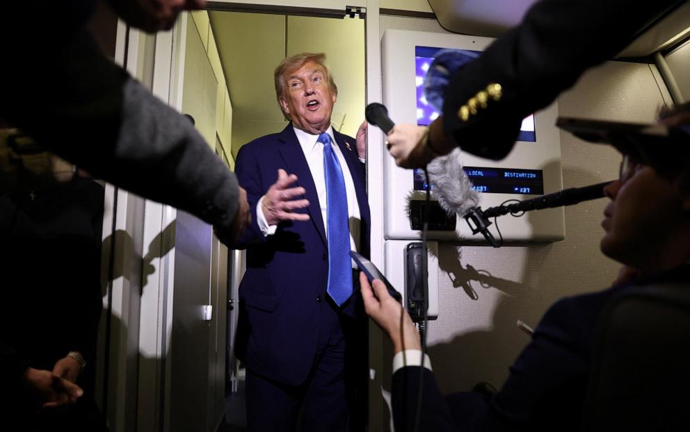PHOTO: President Donald Trump speaks to reporters aboard Air Force One after departing early from the the G7 summit in Canada to return to Washington, June 17, 2025.