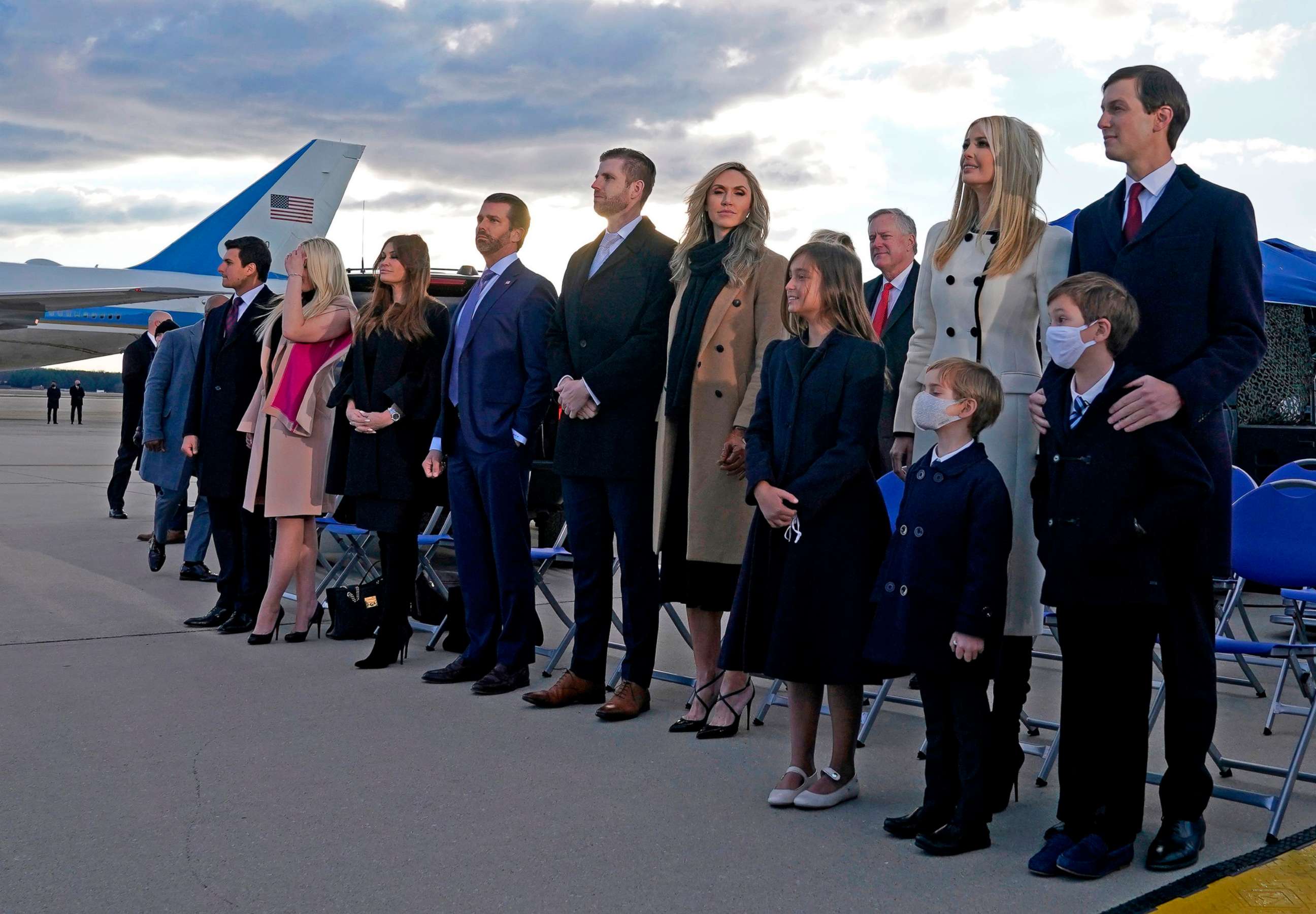 PHOTO: Ivanka Trump, Jared Kushner, their children, Eric Trump, Donald Trump Jr. and Trump family members stand on the tarmac at Joint Base Andrews in Maryland, Jan. 20, 2021.