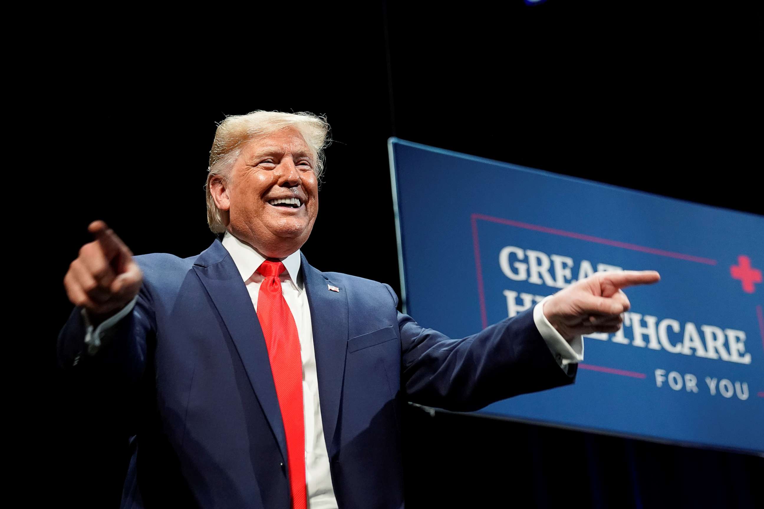 PHOTO: President Donald Trump points to guests during an event on Medicare at The Villages retirement community in The Villages, Florida, Oct. 3, 2019.