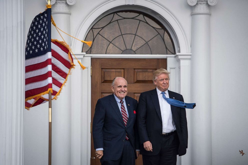 PHOTO: A file photo shows President Donald Trump greeting Rudy Giuliani at the clubhouse at Trump National Golf Club Bedminster in Bedminster Township, N.J., Nov. 20, 2016.