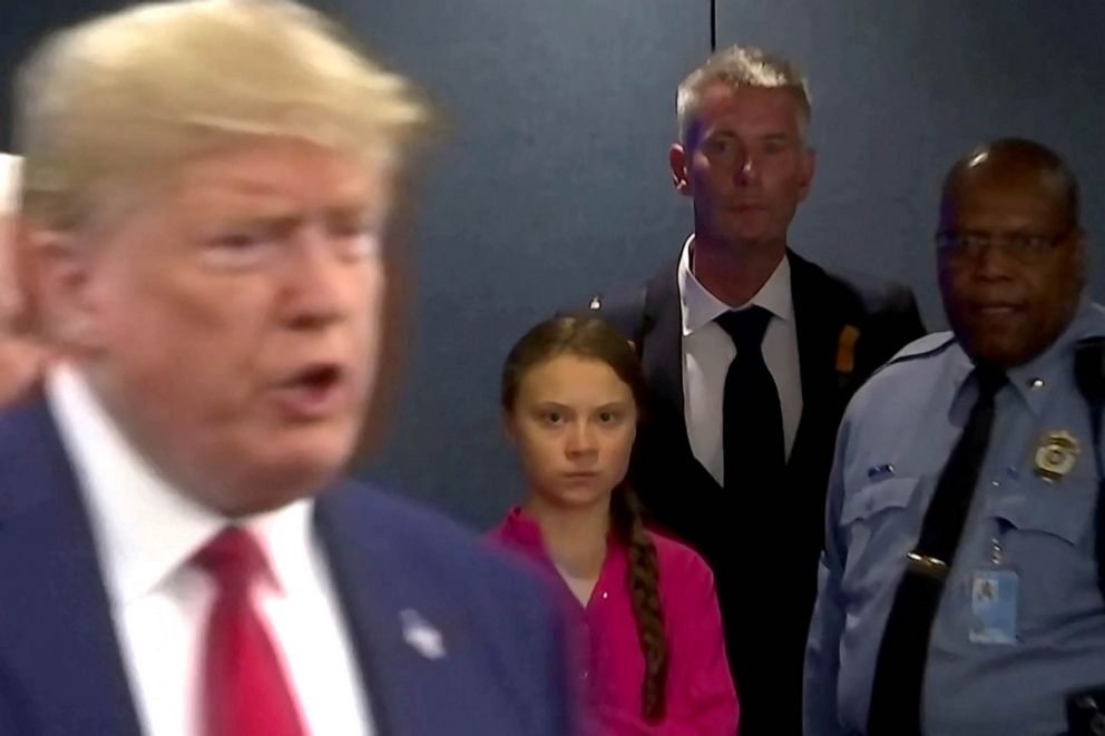 PHOTO: Swedish environmental activist Greta Thunberg watches as President Donald Trump enters the United Nations to speak with reporters in a still image from video taken in New York, Sept. 23, 2019.