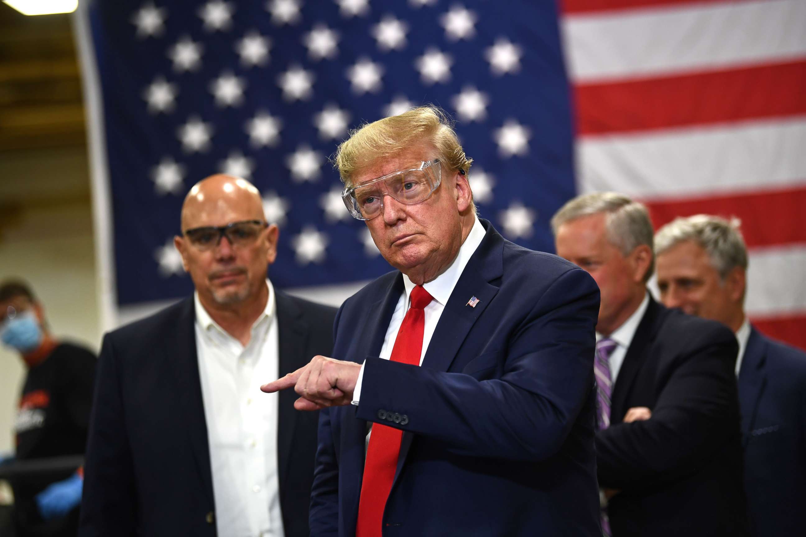 PHOTO: President Donald Trump participates in a tour of a Honeywell International plant that manufactures personal protective equipment in Phoenix, May 5, 2020.
