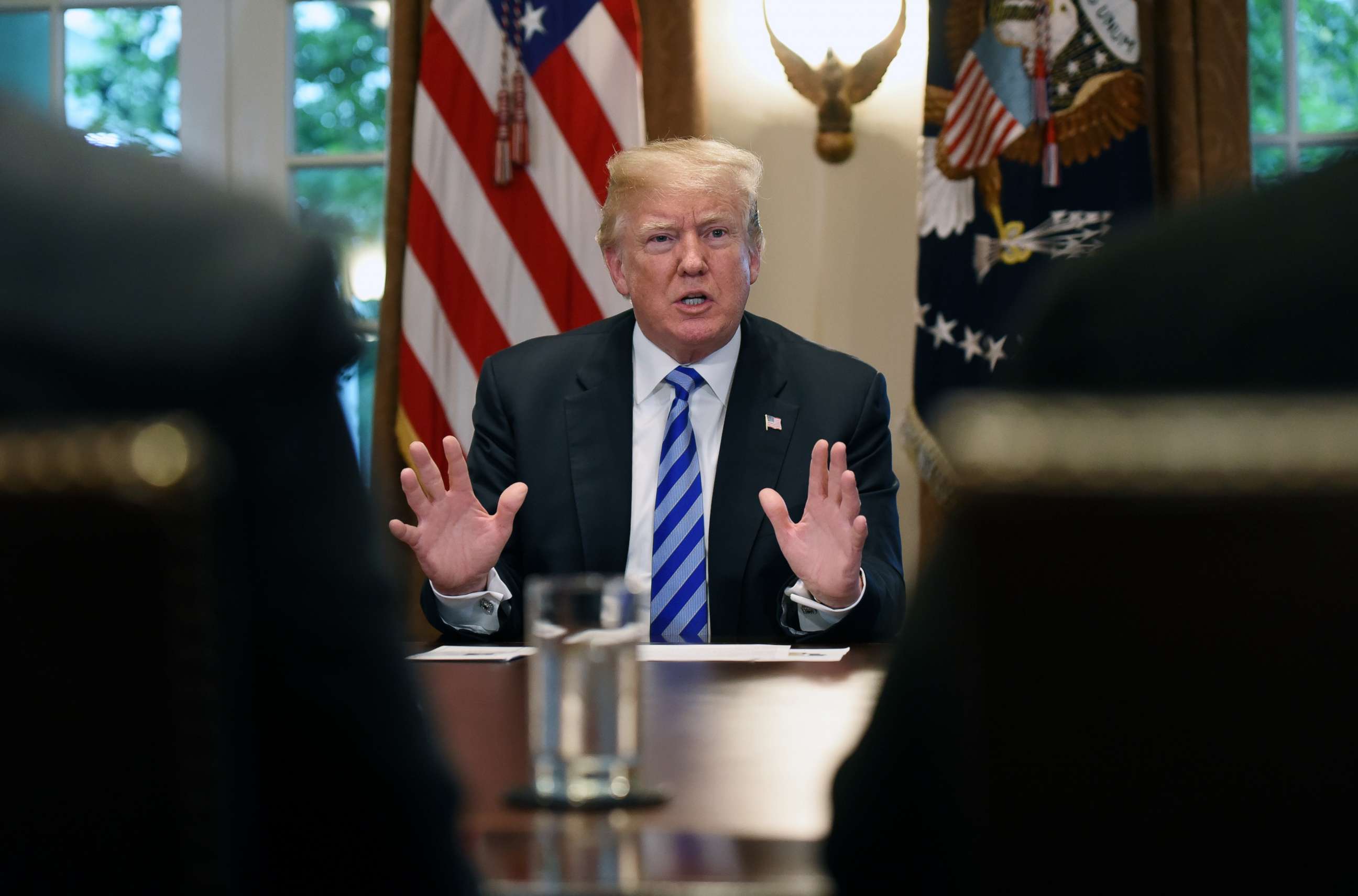 PHOTO: President Donald Trump speaks during a meeting with California leaders and public officials who oppose California's sanctuary policies in the Cabinet Room of the White House, May 16, 2018.