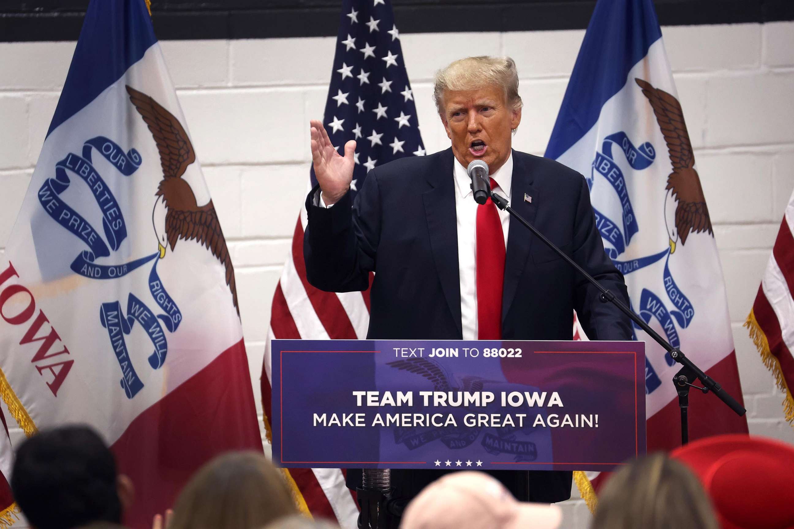 PHOTO: Former President Donald Trump greets supporters at a Team Trump volunteer leadership training event held at the Grimes Community Complex on June 1, 2023, in Grimes, Iowa.