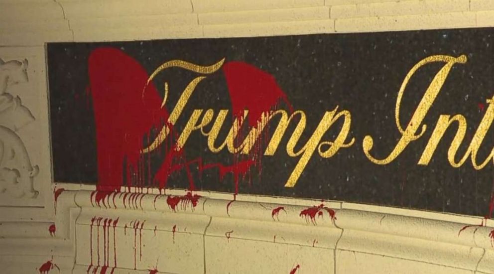 Red paint was splattered on the entrance sign at Trump International Golf Club in West Palm Beach, Florida, on Saturday, March 31, 2018.