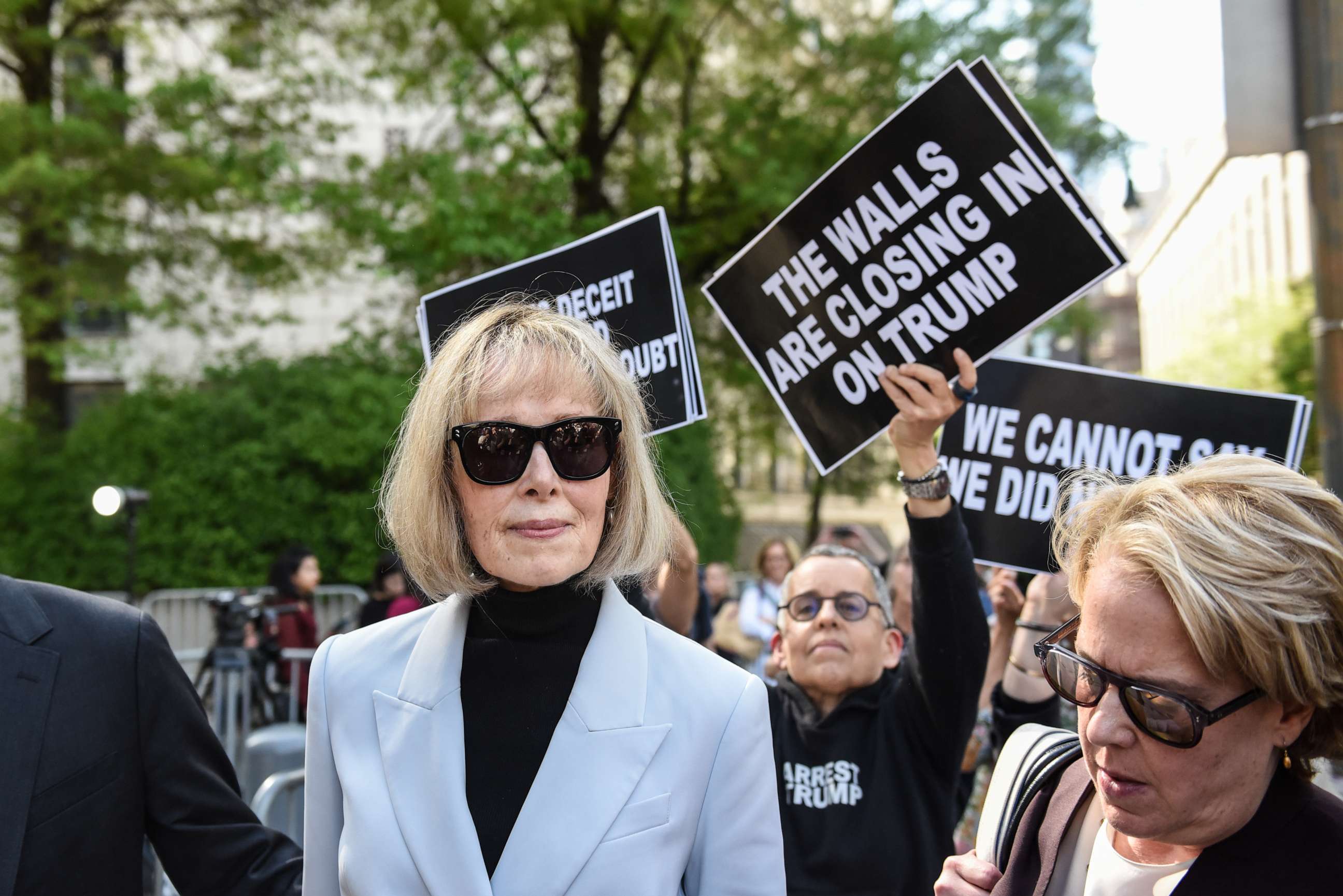 PHOTO: E. Jean Carroll (C) leaves following her trial at Manhattan Federal Court on May 8, 2023 in New York City.