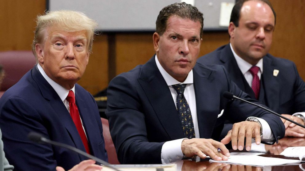 PHOTO: FILE - Former U.S. President Donald Trump sits with his attorneys Joe Tacopina and Boris Epshteyn inside the courtroom during his arraignment at the Manhattan Criminal Court April 4, 2023 in New York City.