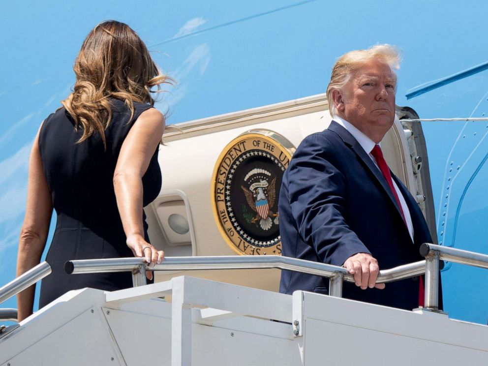 PHOTO: President Donald Trump, with first lady Melania Trump, boards Air Force One at Wright-Patterson Air Force Base in Ohio, Aug. 7, 2019.