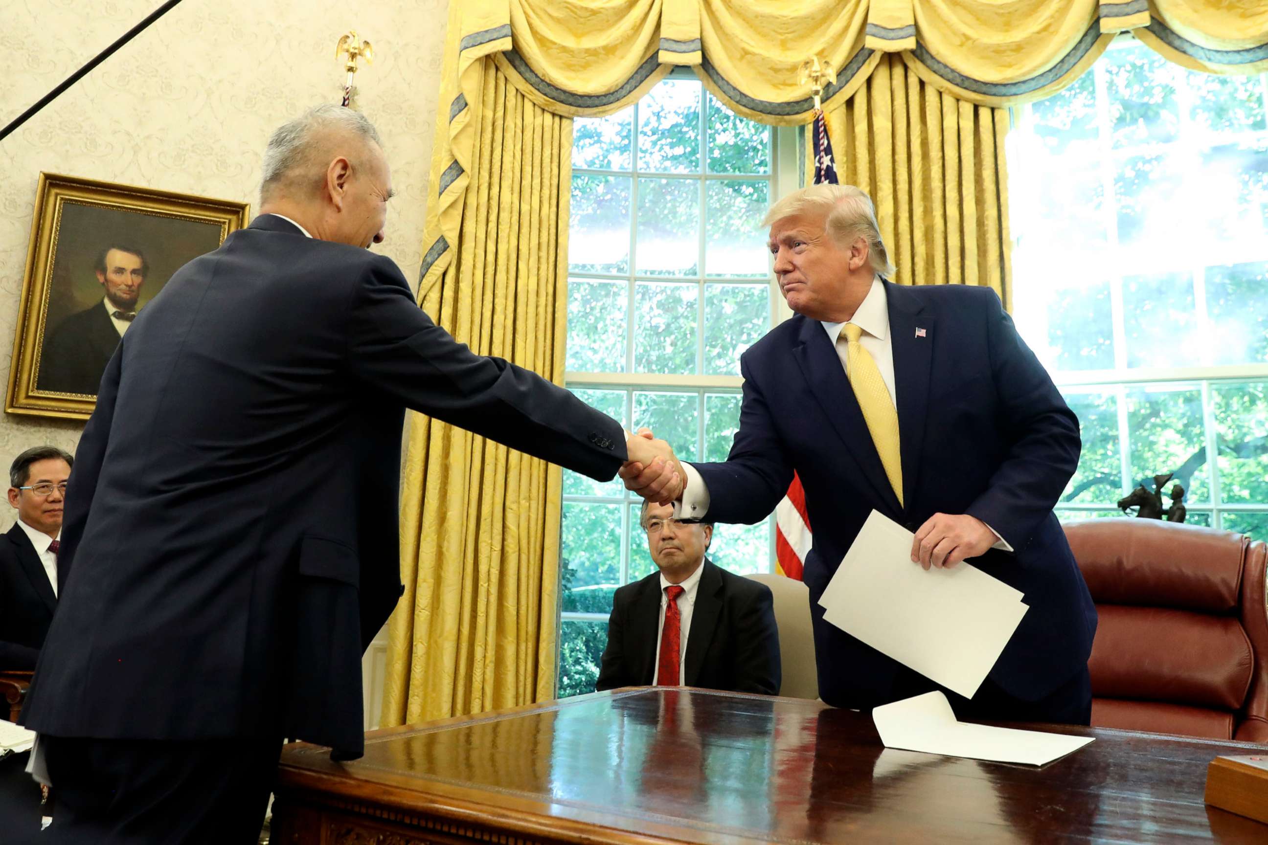 PHOTO: President Donald Trump shakes hands with Vice Premier Liu He in the Oval Office of the White House in Washington, Oct. 11, 2019.