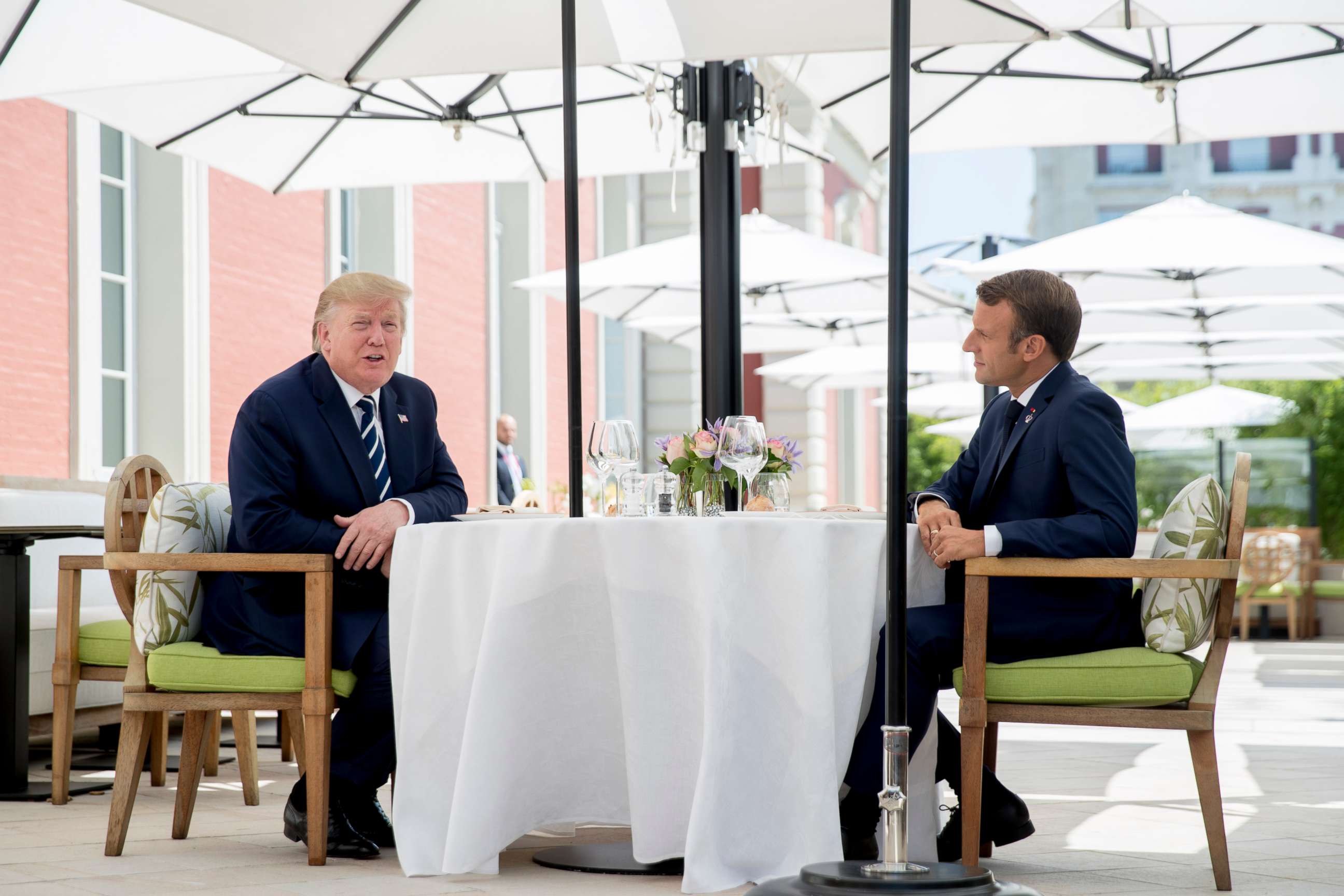 PHOTO: U.S President Donald Trump sits for lunch with French President Emmanuel Macron, right, at the Hotel du Palais in Biarritz, south-west France, Saturday Aug. 24, 2019.