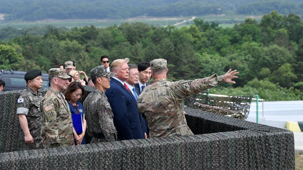 PHOTO: President Donald Trump views North Korea from the Korean Demilitarized Zone from Observation Post Ouellette at Camp Bonifas in South Korea, Sunday, June 30, 2019.