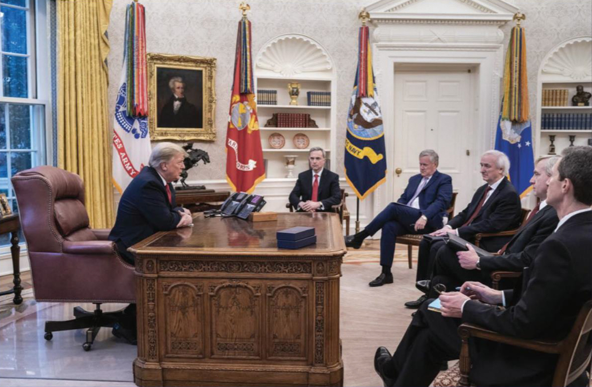 PHOTO: President Donald Trump meets with White House Counsel Pat Cipollone, Chief of Staff Mark Meadows, Acting Attorney General Jeff Rosen, Acting Deputy Attorney General Richard Donoghue, and Deputy White House Counsel Pat Philbin, Dec. 31, 2020.